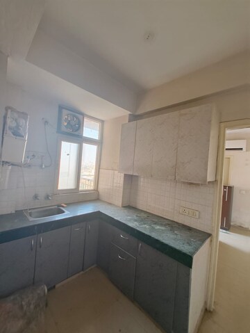 Kitchen in 1 BHK Apartment at Shree Vardhman Green Court, Sector 90 – for Rent