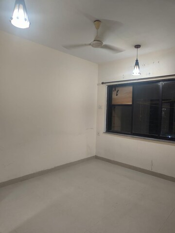 Living Room in 2 BHK Apartment at K Raheja Palm Court, Malad West – for Rent