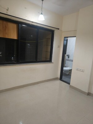 Room in 2 BHK Apartment at K Raheja Palm Court, Malad West – for Rent