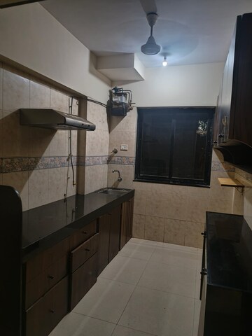 Kitchen in 2 BHK Apartment at K Raheja Palm Court, Malad West – for Rent