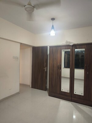 Room in 2 BHK Apartment at K Raheja Palm Court, Malad West – for Rent