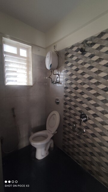 Bathroom in 1 BHK Apartment at Raunak Unnathi Greens, Kasarvadavali – for Rent