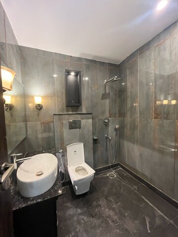 Bathroom in 3.5 BHK Builder Floor at Ansal Sushant Lok I, Sector 43 – for Sale