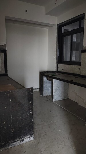 Kitchen in 3 BHK Apartment at Dhamji Shamji Mahavir Spring Tulip Phase 1, Pokhran Road No Two – for Sale
