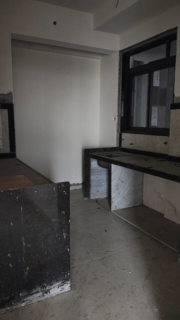 Kitchen in 3 BHK Apartment at Dhamji Shamji Mahavir Spring Tulip Phase 1, Pokhran Road No Two – for Sale