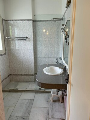 Bathroom in 3 BHK Builder Floor at Boutique Residential Apartments C-253, Defence Colony – for Rent