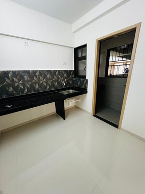 Kitchen in 2 BHK Apartment at Kohinoor Courtyard One, Wakad – for Sale