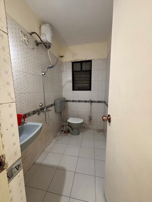 Bathroom in 2 BHK Apartment at Goel Ganga Hill Mist Garden, Kondhwa – for Rent