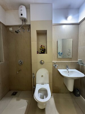 Bathroom in 1 BHK Apartment at Puranik City Reserva, Ghodbunder Road – for Rent