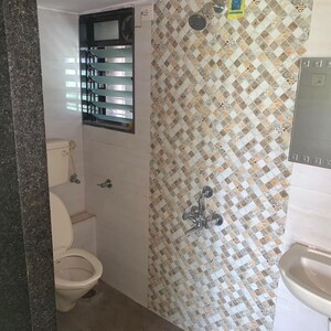 Bathroom in 2 BHK Apartment at Charms City, Titwala – for Rent