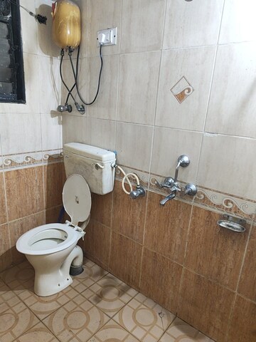 Bathroom in 2 BHK Apartment at Kopar Khairane Sector 20 – for Rent
