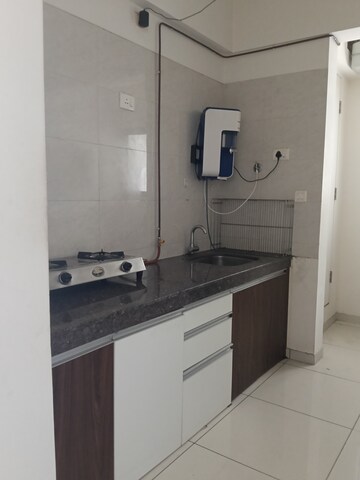 Kitchen in 1 BHK Apartment at Duville Riverdale Heights, Kharadi – for Rent