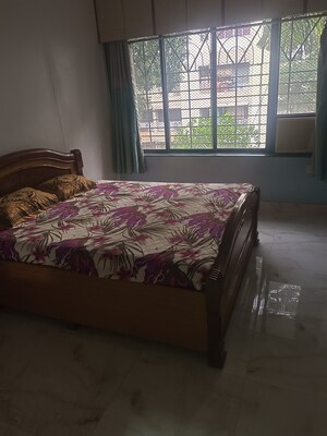 Bedroom in 2 BHK Apartment at Lokpuram CHS, Vasant Vihar – for Rent