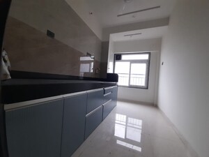 Kitchen in 2 BHK Apartment at Prem Tower, Goregaon West – for Rent