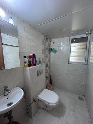 Bathroom in 2 BHK Apartment at DLH Metroview, Andheri West – for Sale