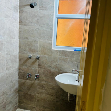 Bathroom in 1 BHK Apartment at Wave Dream Homes, Ram Nagar – for Rent