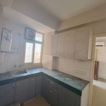 Kitchen in 1 BHK Apartment at Shree Vardhman Green Court, Sector 90 – for Sale
