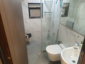 Bathroom in 2 BHK Apartment at Anmol Society, Marol – for Rent