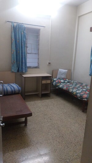 Bedroom in 2 BHK Apartment at Sahil Apartment Anudh, Aundh – for Rent