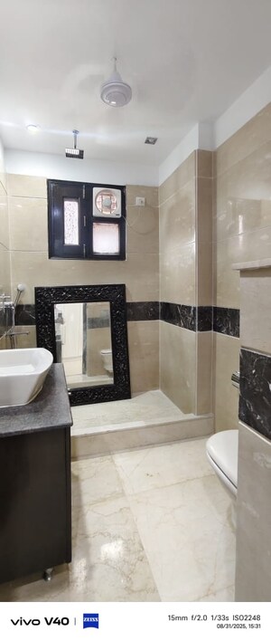 Bathroom in 3 BHK Builder Floor at Defence Colony – for Rent