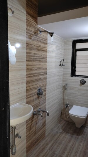 Bathroom in 1 BHK Apartment at Naupada – for Sale