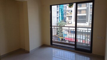 Living Room in 1 BHK Apartment at Naupada – for Sale