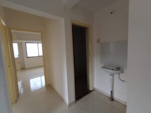 Room in 2 BHK Apartment at Shikrapur – for Sale