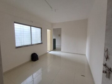 Living Room in 2 BHK Apartment at Shikrapur – for Sale