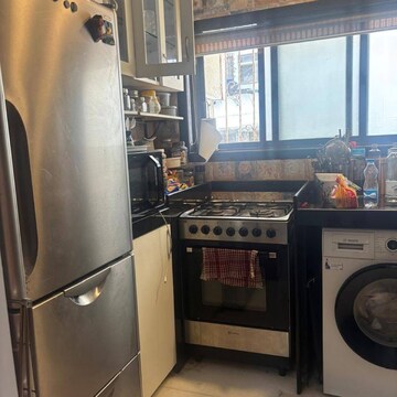 Kitchen in 2 BHK Apartment at Laxmi Apartments Bandra West, Patkar Blocks – for Rent