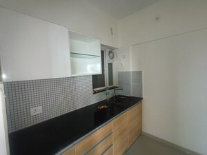 Kitchen in 1 BHK Apartment at Omkar Signet, Malad East – for Rent