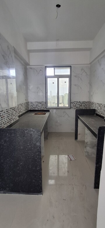 Kitchen in 2 BHK Apartment at DGS Sheetal Tapovan, Malad East – for Rent