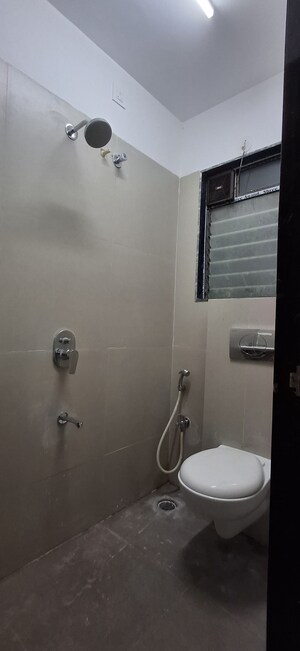 Bathroom in 1 BHK Apartment at Je And Vee Om Trimurti, Malad East – for Rent