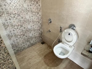 Bathroom in 1 BHK Apartment at Raunak Delight, Owale – for Sale