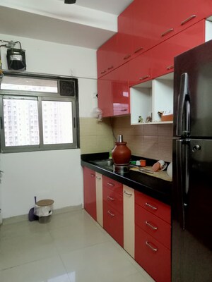 Kitchen in 1 BHK Apartment at Raunak Delight, Owale – for Sale