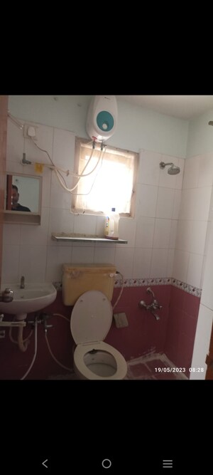 Bathroom in 2 BHK Apartment at B Desai Anand Crystal, Tragad – for Rent