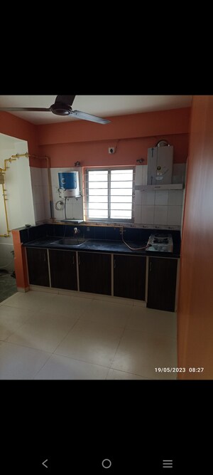 Kitchen in 2 BHK Apartment at B Desai Anand Crystal, Tragad – for Rent