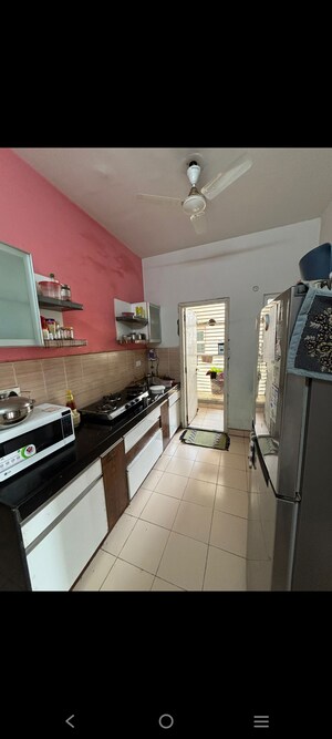 Kitchen in 2 BHK Apartment at Godrej Garden City, Jagatpur – for Rent