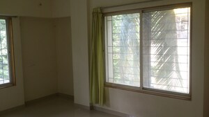 Bedroom in 2.5 BHK Apartment at Belvalkar Kalpak CHS, Dahanukar Colony – for Rent