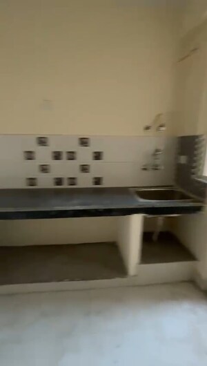 Kitchen in 2.5 BHK Apartment at Eureka Diya Green City, Raj Nagar Extension – for Sale