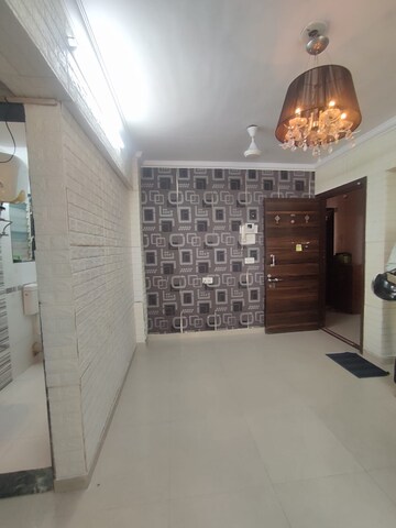 Living Room in 1 BHK Apartment at Mahavir Kalpavruksha, Ghodbunder Road – for Rent