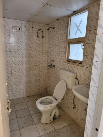 Bathroom in 2 BHK Apartment at Adore Happy Homes, Sector 86 – for Rent