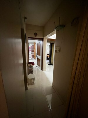 Building Lobby in 2 BHK Apartment at Sai Dham CHS, Dhanori – for Rent