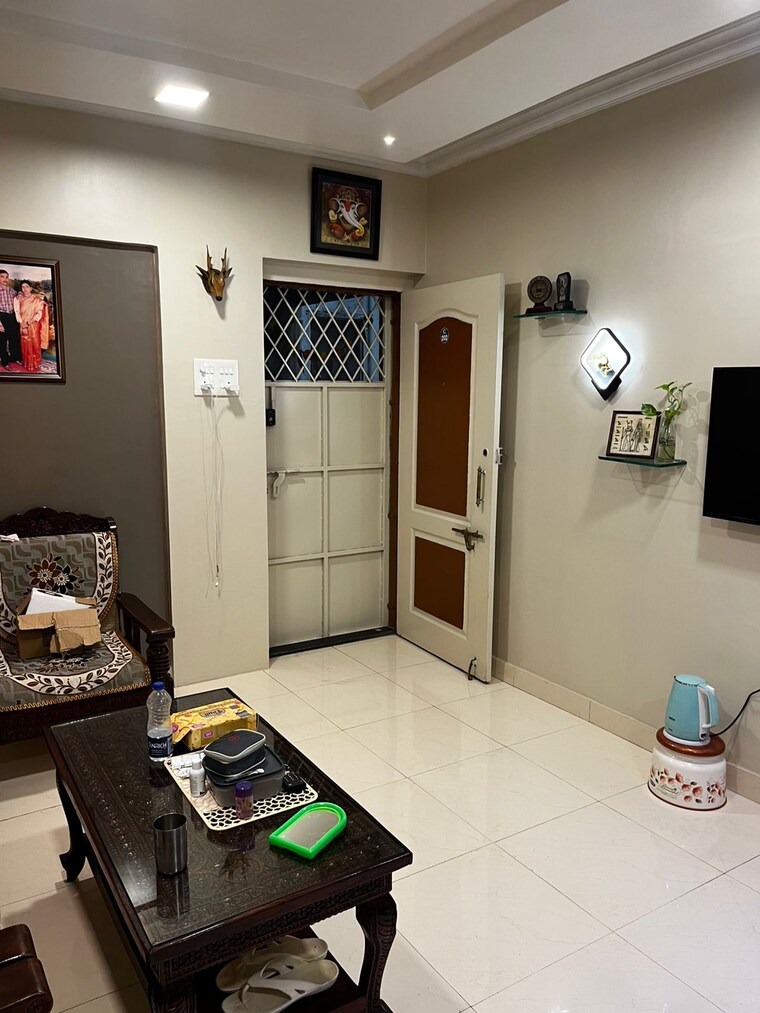 Living Room, sai-dham-chs 2 Bedroom 900 Sq.Ft. Apartment In Dhanori Pune 9251823