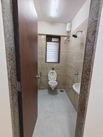Bathroom in 1 BHK Apartment at Abrol Signature, Malad West – for Rent