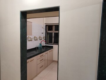 Kitchen in 1 BHK Apartment at Swastik Palms CHS, Brahmand – for Rent