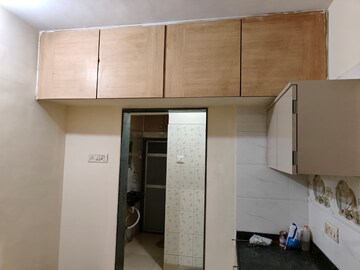 Kitchen in 1 BHK Apartment at Swastik Palms CHS, Brahmand – for Rent