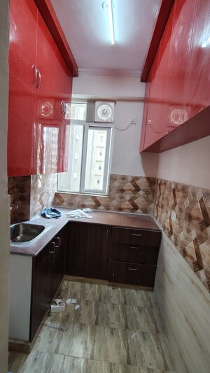 Kitchen in 2 BHK Apartment at Amrapali Golf Homes, Sector 4 Greater Noida – for Rent