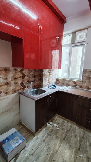 Kitchen in 2 BHK Apartment at Amrapali Golf Homes, Sector 4 Greater Noida – for Rent