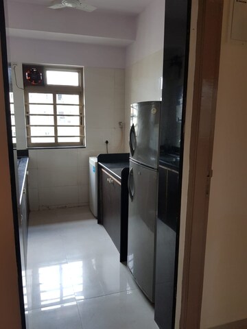 Kitchen in 2 BHK Apartment at Takshila CHS, Andheri East – for Rent