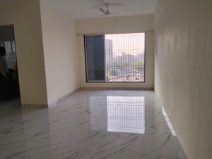 Room in 2 BHK Apartment at Metro Millennium, Malad West – for Sale